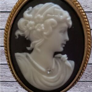 Avon Cameo black and white with gold tone. Brooch and pendant. Mourning